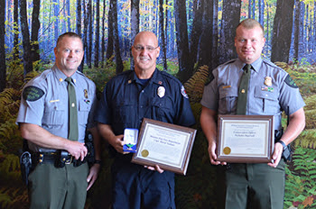 Michigan conservation officer, Monroe firefighter recognized for water rescue of stranded teenager